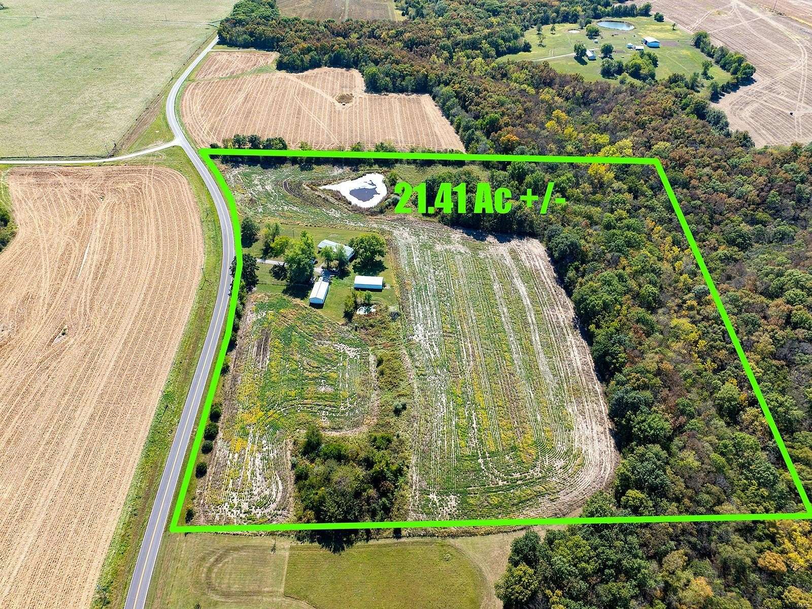 21.41 Acres of Agricultural Land with Home for Sale in Vandalia, Missouri