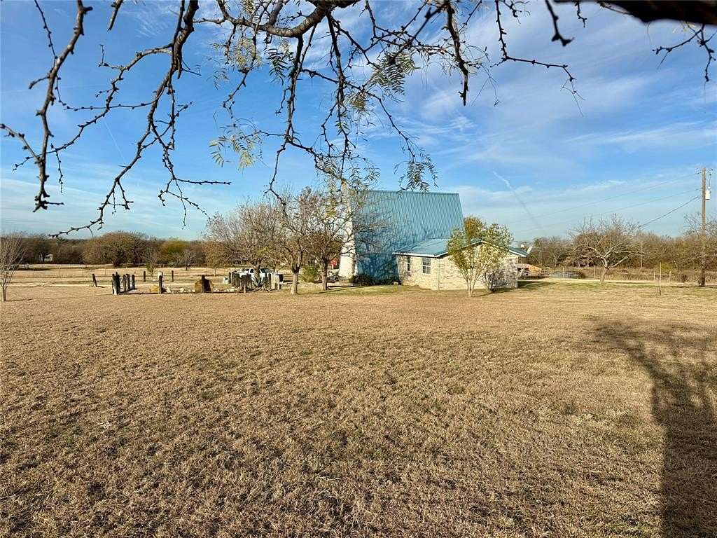 4.516 Acres of Residential Land with Home for Sale in Blum, Texas