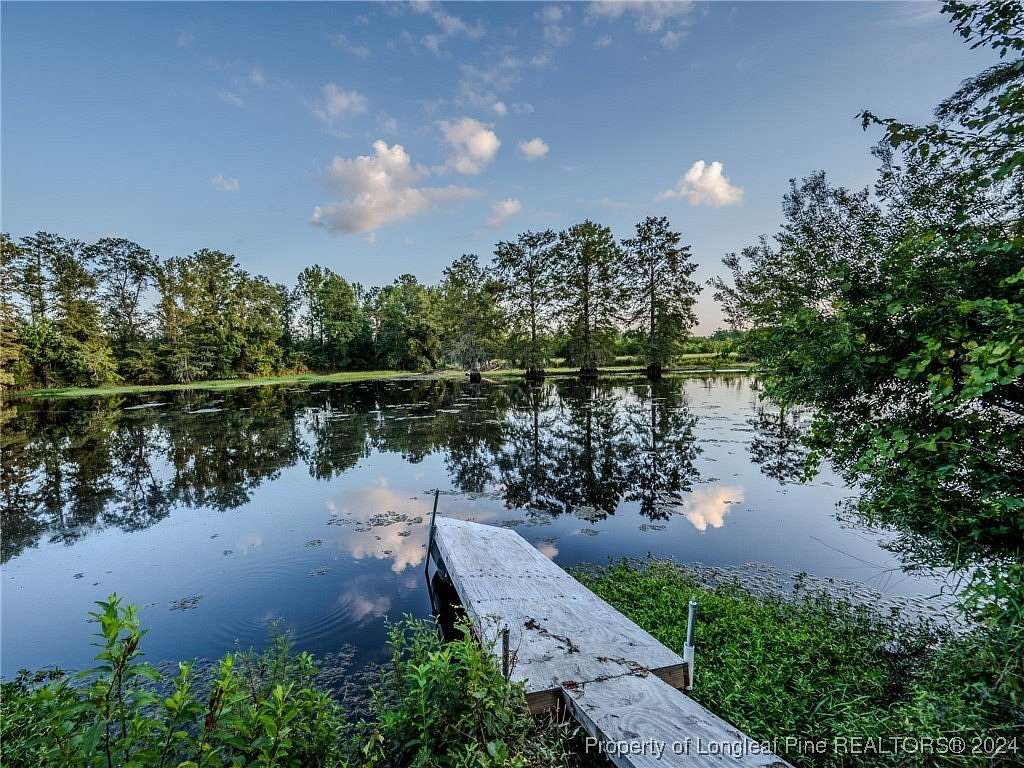 86 Acres of Land with Home for Sale in Fairmont, North Carolina