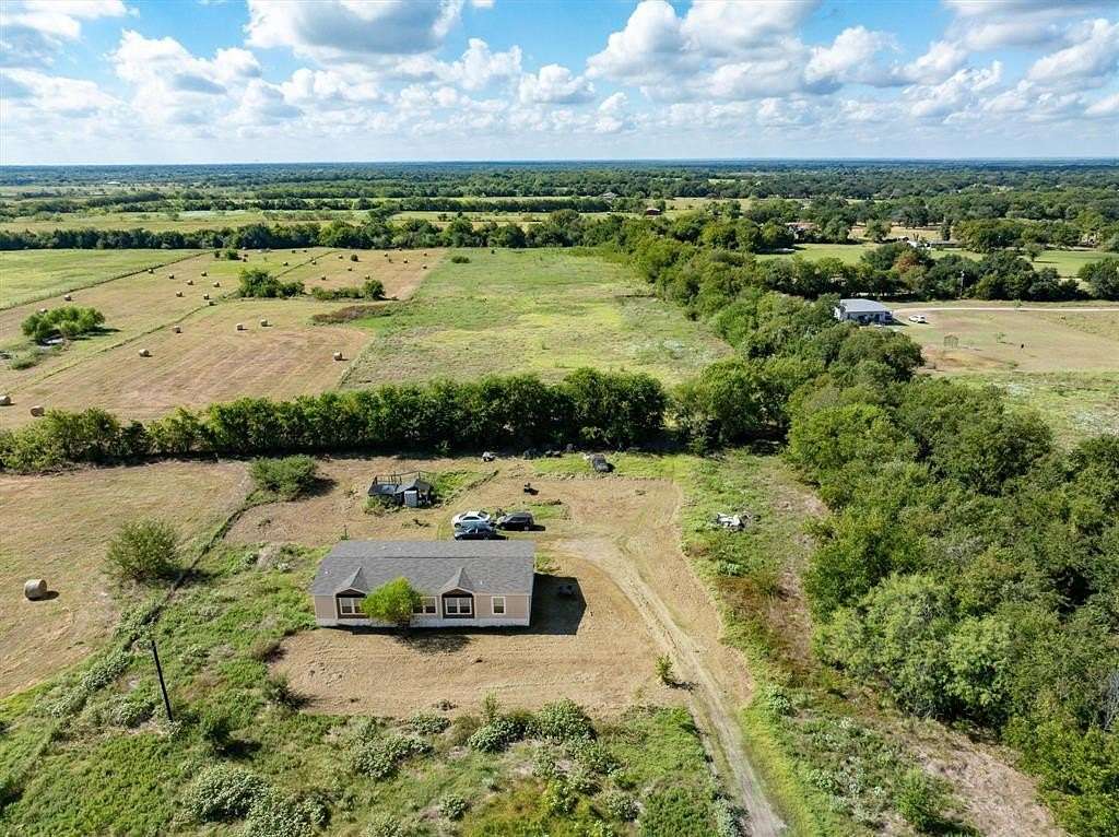 12 Acres of Land with Home for Sale in Scurry, Texas