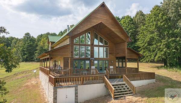 72.9 Acres of Recreational Land with Home for Sale in Atlanta, Texas