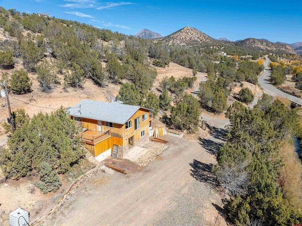 5 Acres of Residential Land with Home for Sale in Crawford, Colorado