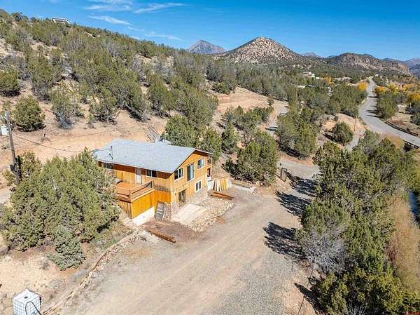 5 Acres of Residential Land with Home for Sale in Crawford, Colorado