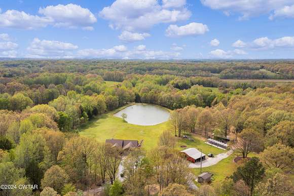 25 Acres of Land with Home for Sale in Milan, Tennessee