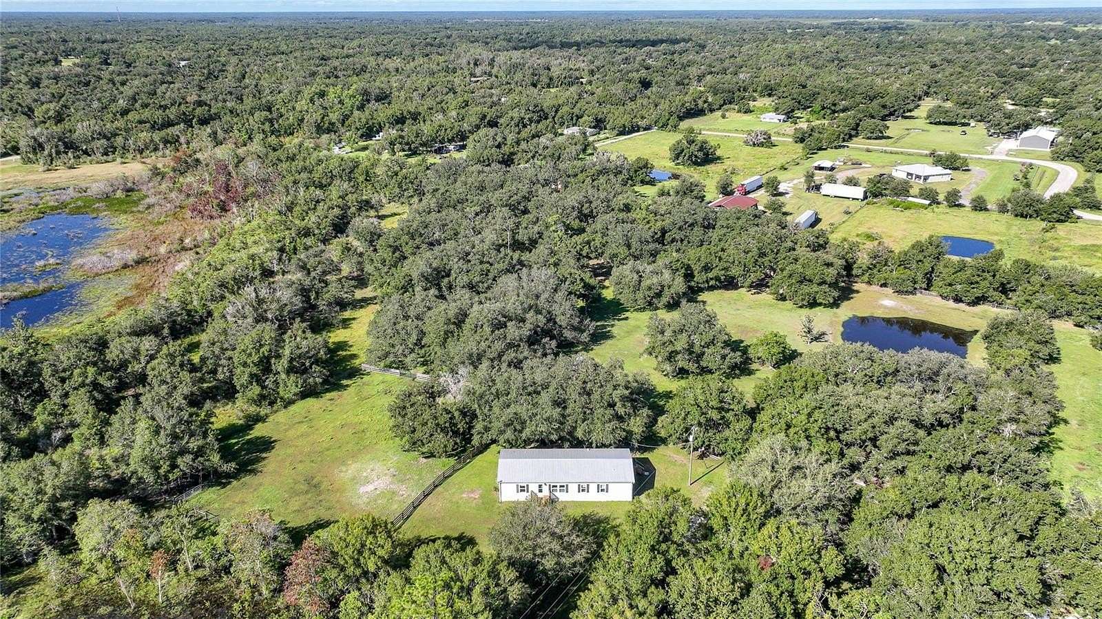 5.57 Acres of Land with Home for Sale in Arcadia, Florida