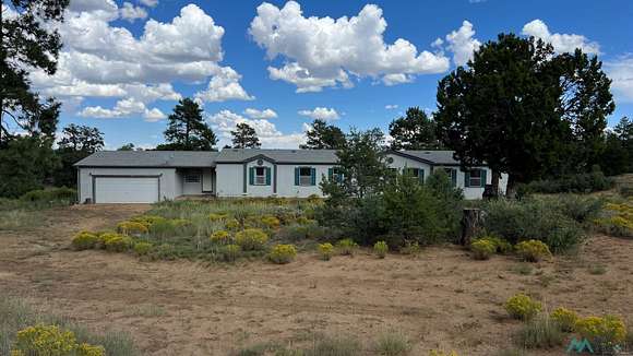 69.4 Acres of Recreational Land with Home for Sale in Pie Town, New Mexico