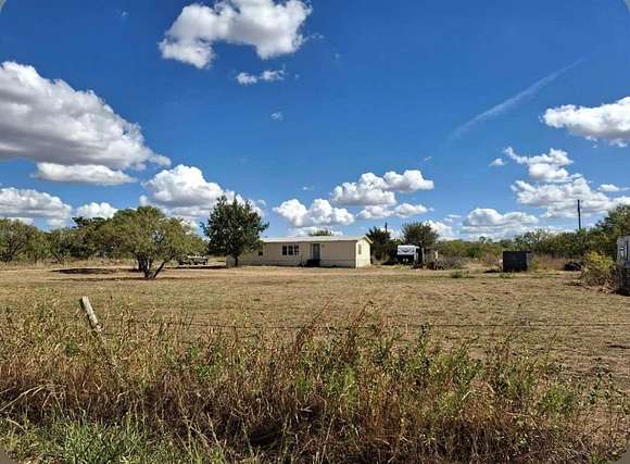 4 Acres of Residential Land with Home for Sale in Clyde, Texas