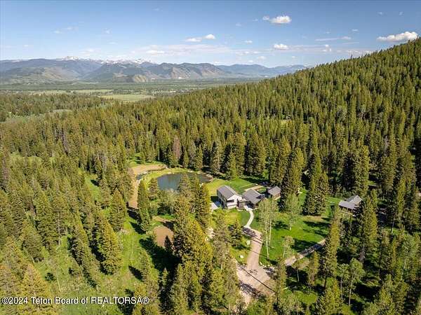199 Acres of Recreational Land with Home for Sale in Wilson, Wyoming