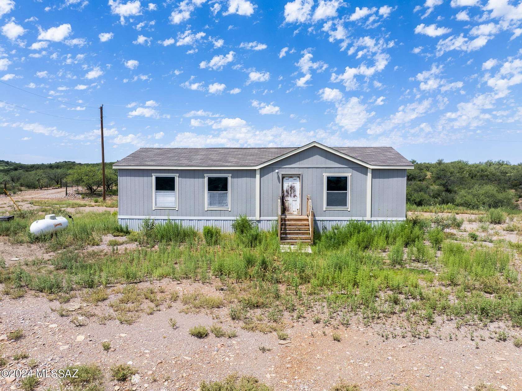 5 Acres of Residential Land with Home for Sale in Arivaca, Arizona