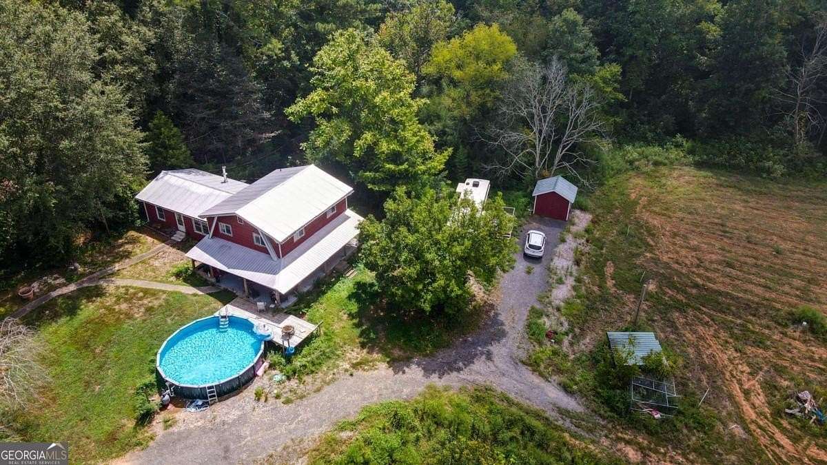 15.8 Acres of Recreational Land with Home for Sale in Woodstock, Georgia