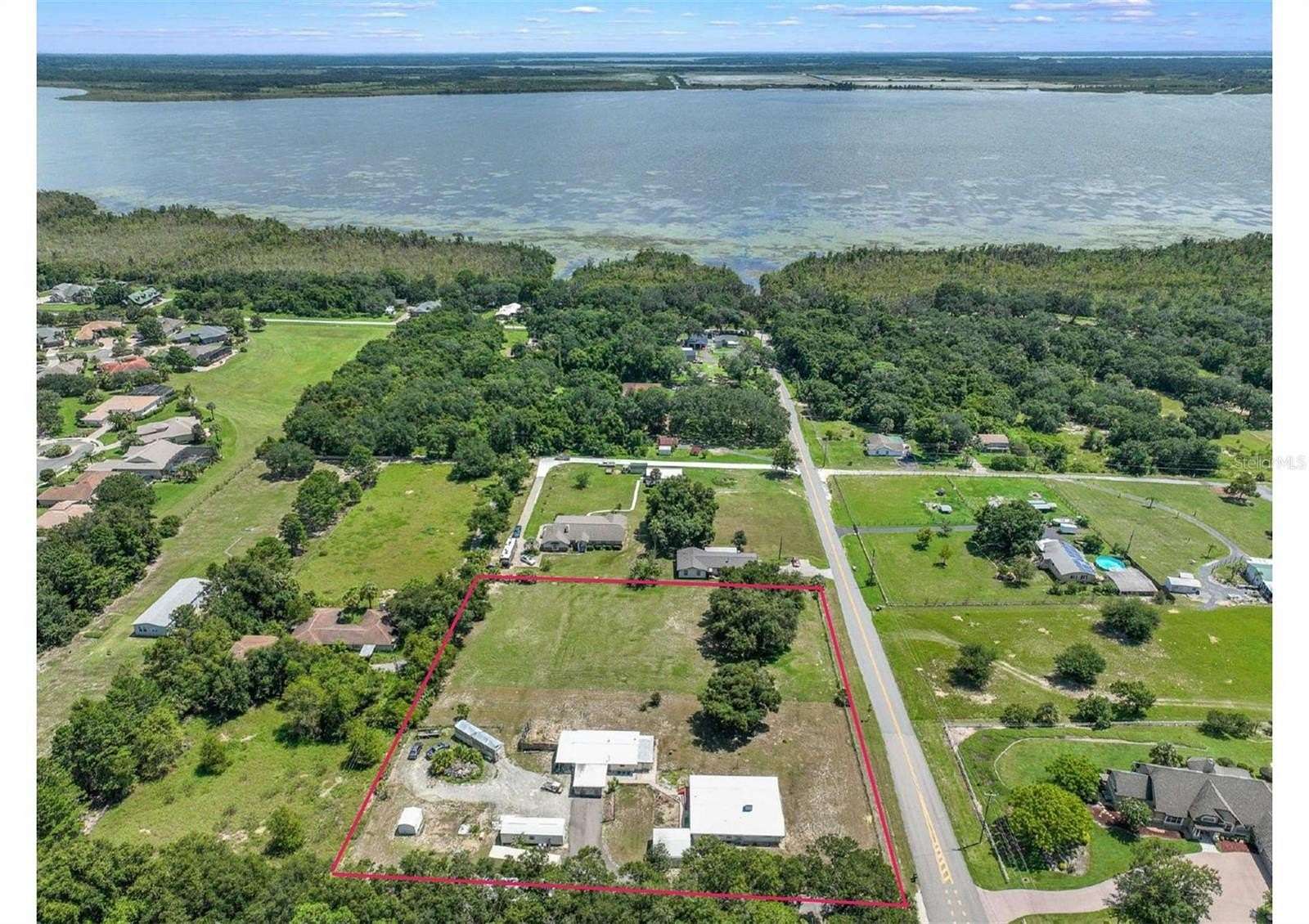 2.45 Acres of Residential Land with Home for Sale in Lady Lake, Florida