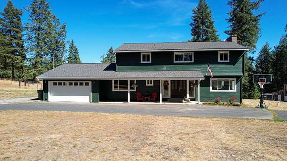 12.14 Acres of Land with Home for Sale in Mead, Washington