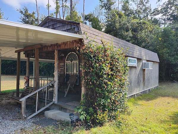 0.55 Acres of Land with Home for Sale in Donalsonville, Georgia