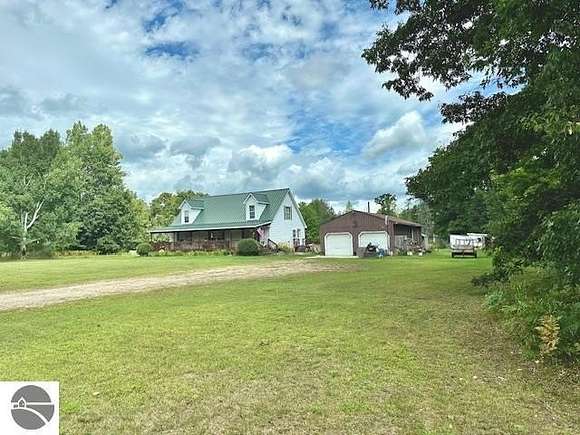 22.4 Acres of Land with Home for Sale in Weidman, Michigan