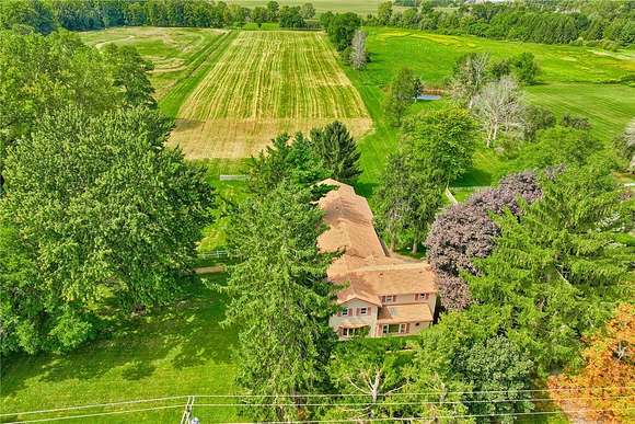 9 Acres of Land with Home for Sale in Webster, New York