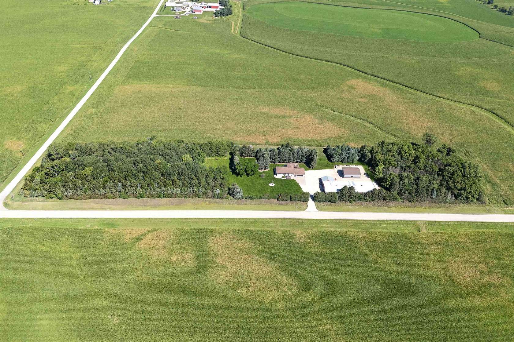 7.82 Acres of Residential Land with Home for Sale in Farley, Iowa