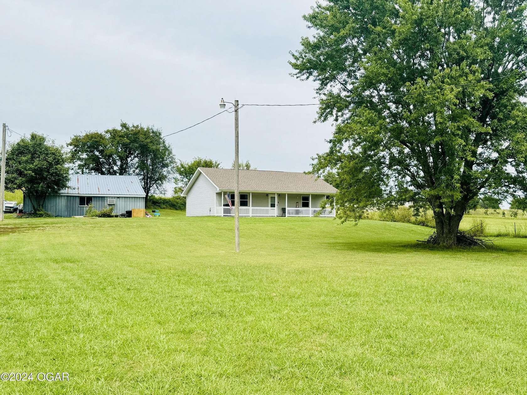 2 Acres of Residential Land with Home for Sale in Granby, Missouri