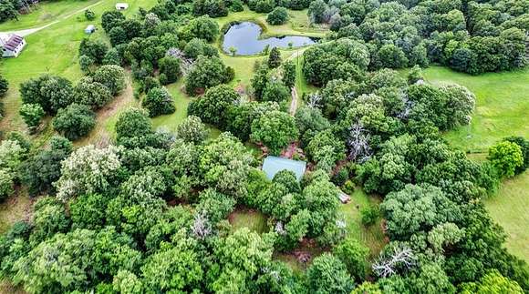 24 Acres of Recreational Land with Home for Sale in Honey Grove, Texas