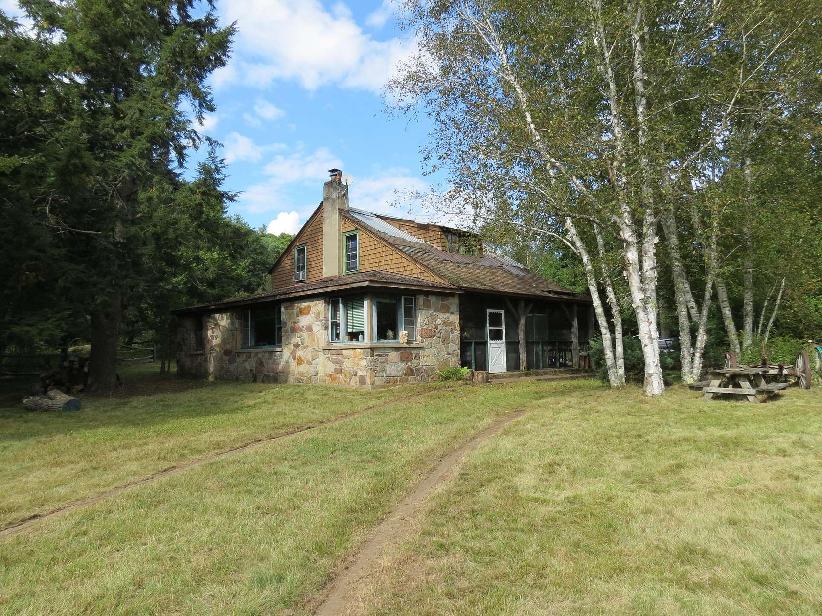 18.38 Acres of Recreational Land with Home for Sale in Upper Jay, New York