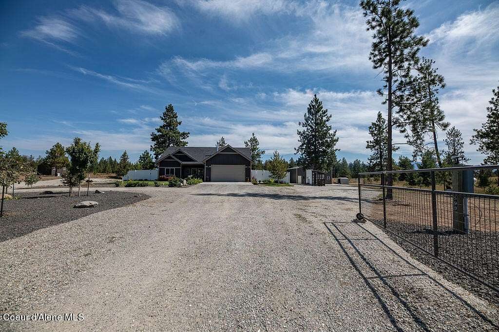 5.1 Acres of Residential Land with Home for Sale in Athol, Idaho