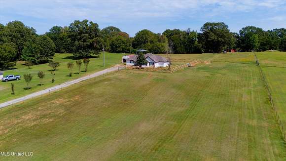 4.4 Acres of Residential Land with Home for Sale in Senatobia, Mississippi