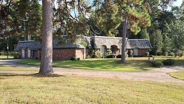 9 Acres of Land with Home for Sale in Timpson, Texas