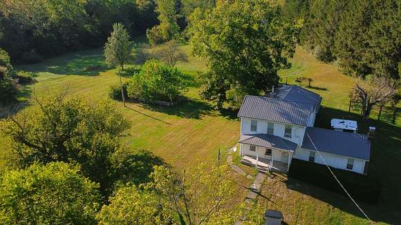 250 Acres of Land with Home for Sale in Pedro, Ohio