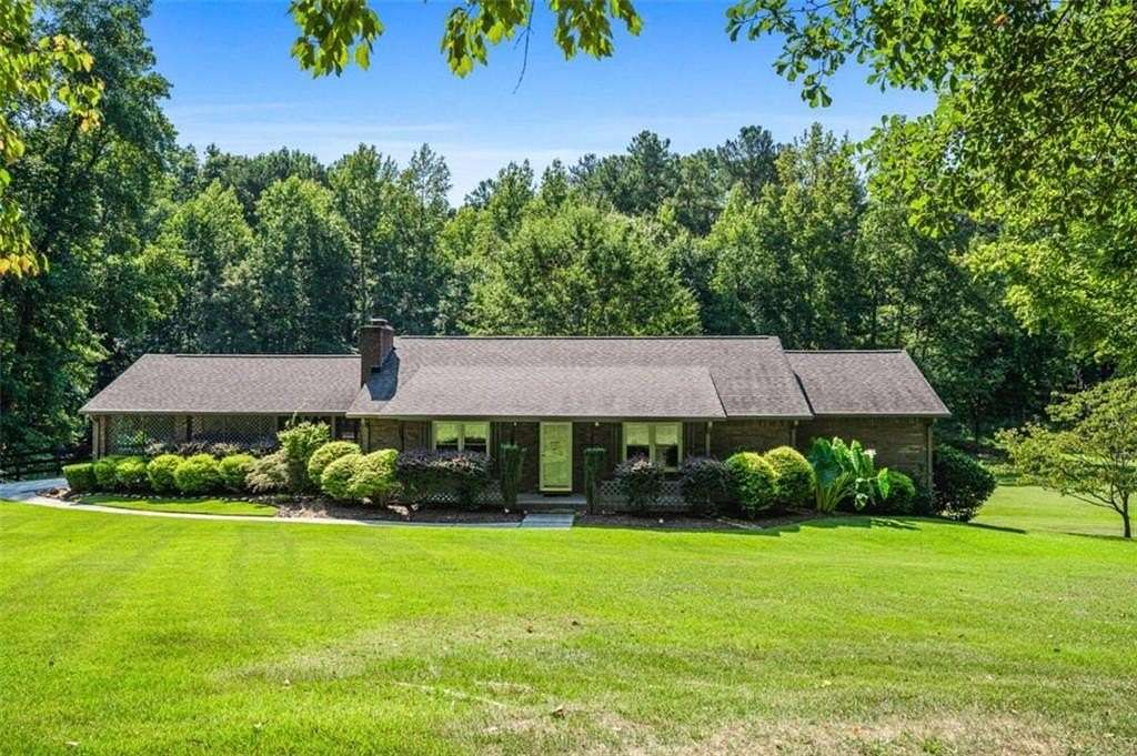 6.1 Acres of Residential Land with Home for Sale in Powder Springs, Georgia