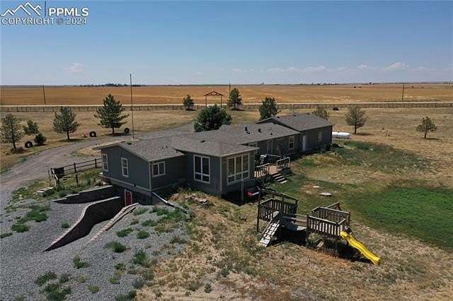 39.16 Acres of Agricultural Land with Home for Sale in Byers, Colorado