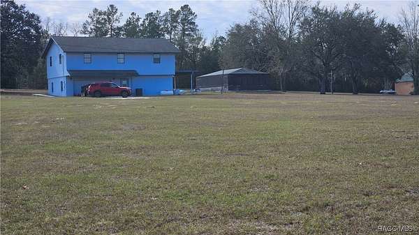 1.9 Acres of Residential Land with Home for Sale in Lecanto, Florida