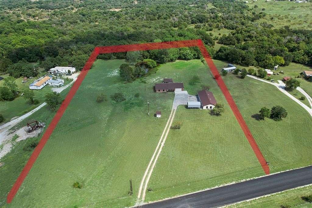 5 Acres of Residential Land with Home for Sale in Springtown, Texas