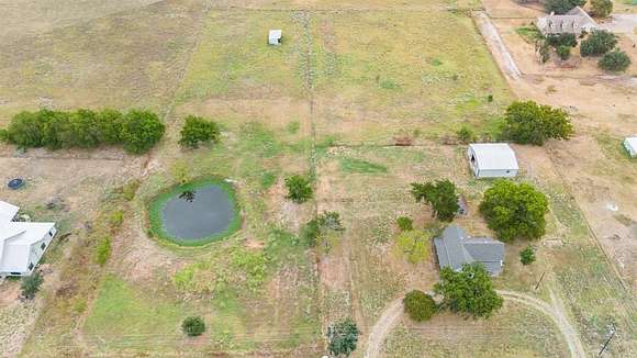 5.245 Acres of Land with Home for Sale in Klondike, Texas