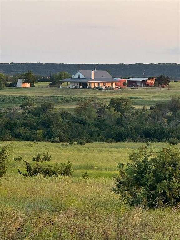 256 Acres of Agricultural Land with Home for Sale in Cranfills Gap, Texas