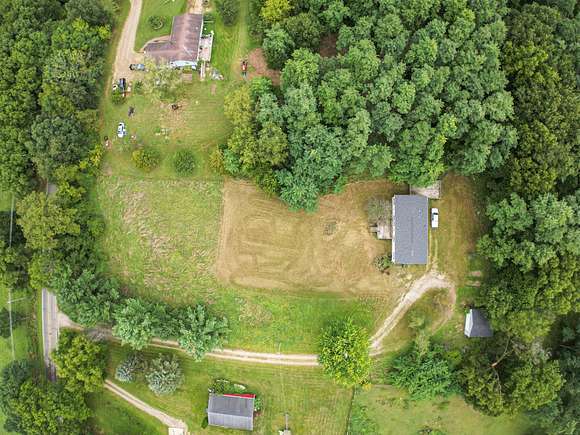 5.27 Acres of Residential Land with Home for Sale in Horton, Michigan