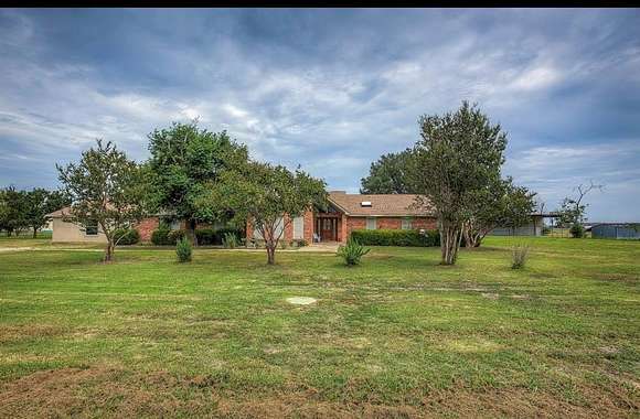 3.507 Acres of Residential Land with Home for Sale in Oak Ridge, Texas