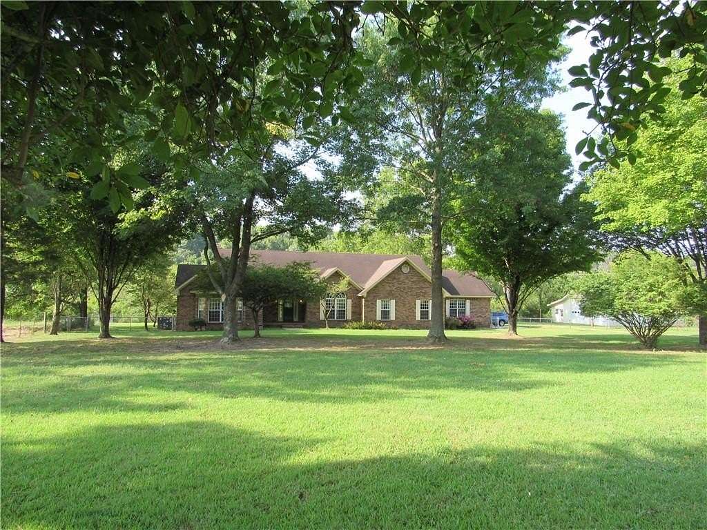 10 Acres of Land with Home for Sale in Elm Springs, Arkansas