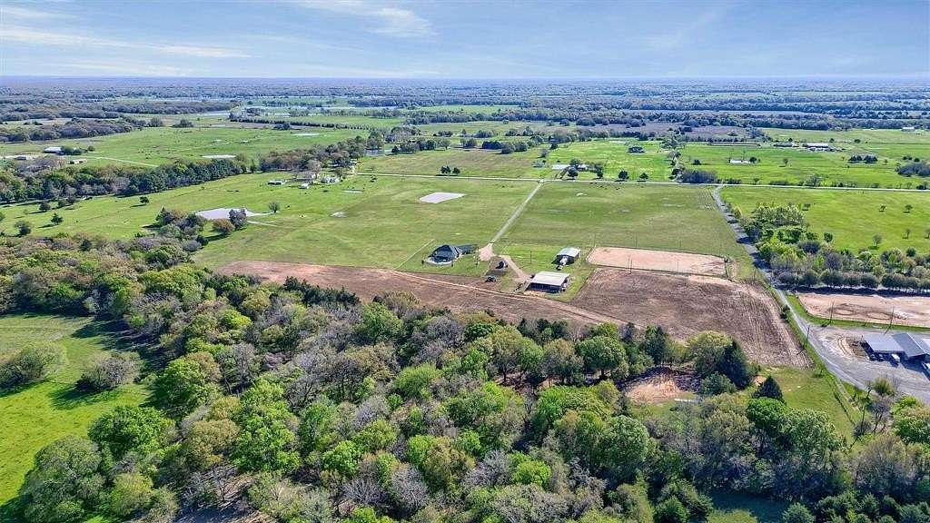 48.703 Acres of Agricultural Land with Home for Sale in Ravenna, Texas