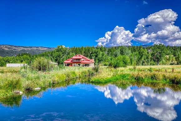 1,571 Acres of Land with Home for Sale in Tierra Amarilla, New Mexico