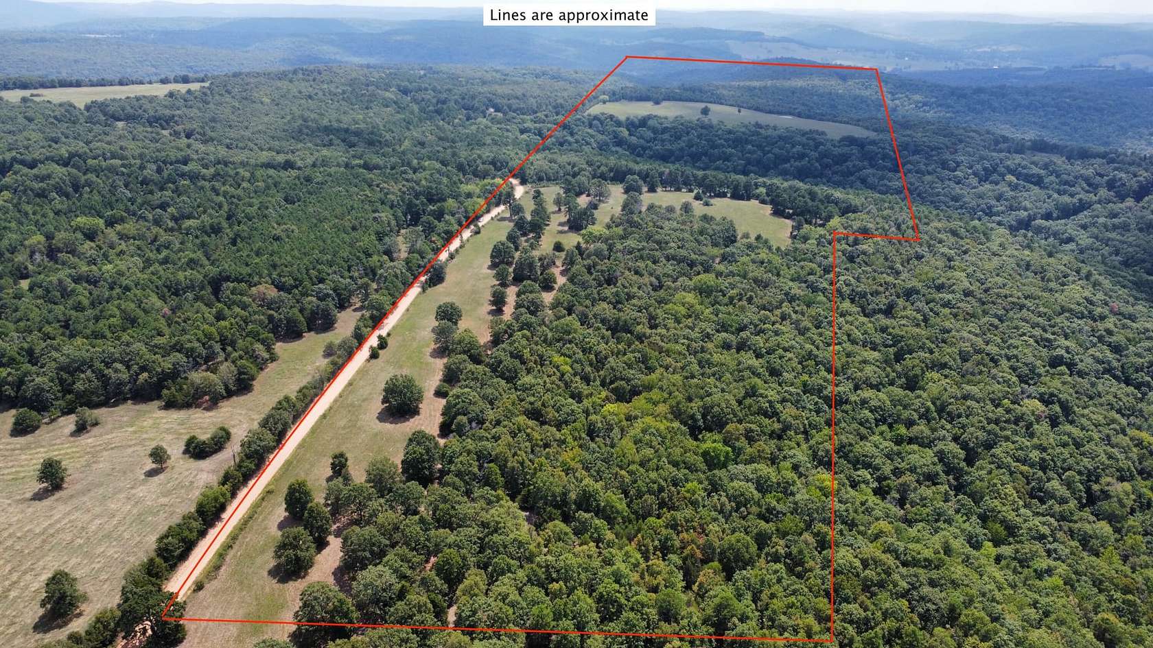 199 Acres of Recreational Land with Home for Sale in Berryville, Arkansas