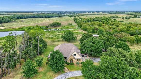 80 Acres of Agricultural Land with Home for Sale in Pottsboro, Texas