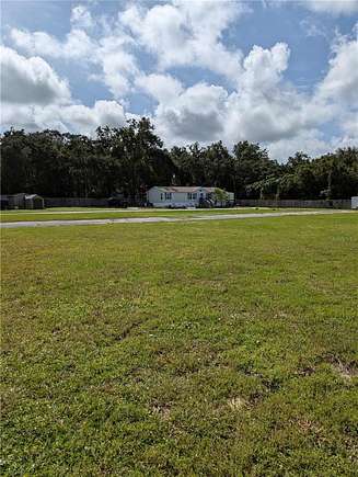 2.5 Acres of Residential Land with Home for Sale in Spring Hill, Florida