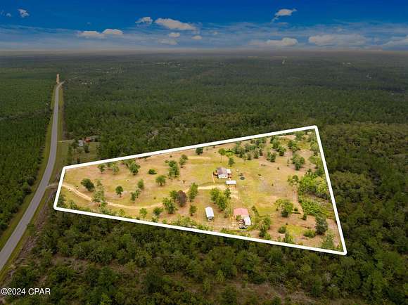 10 Acres of Land with Home for Sale in Altha, Florida