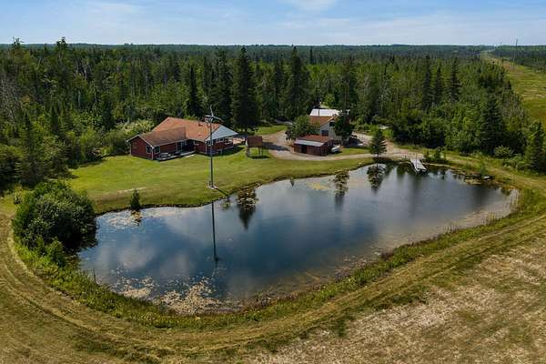 114 Acres of Recreational Land with Home for Sale in Posen, Michigan