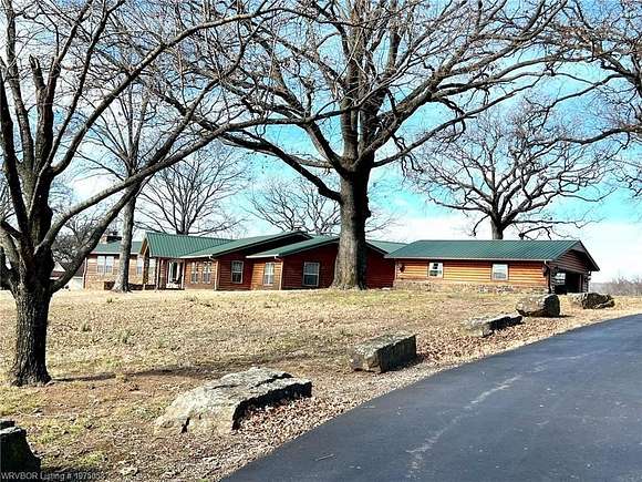 216 Acres of Agricultural Land with Home for Sale in Sallisaw, Oklahoma