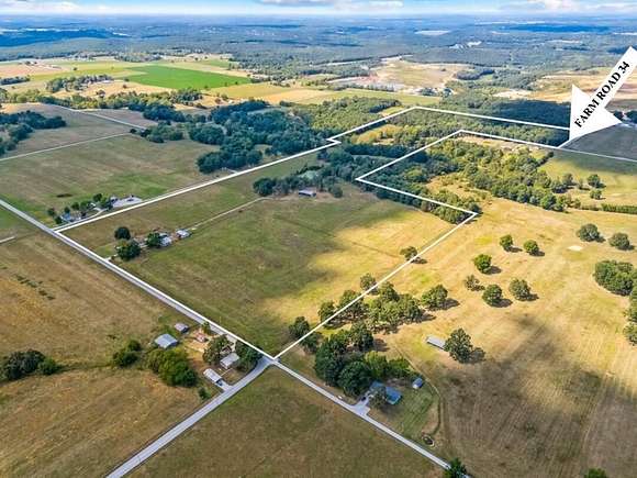 69 Acres of Land with Home for Sale in Willard, Missouri