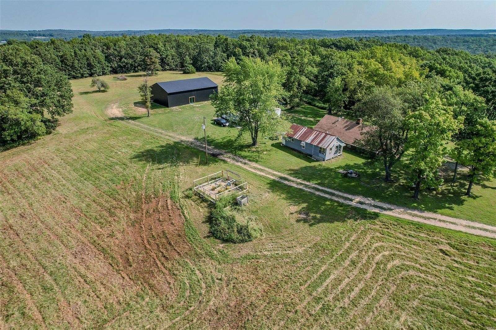 98 Acres of Recreational Land with Home for Sale in Falcon, Missouri