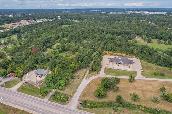 7.6 Acres of Improved Commercial Land for Sale in Poplar Bluff, Missouri