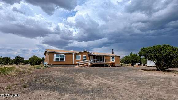 5 Acres of Residential Land with Home for Sale in Show Low, Arizona