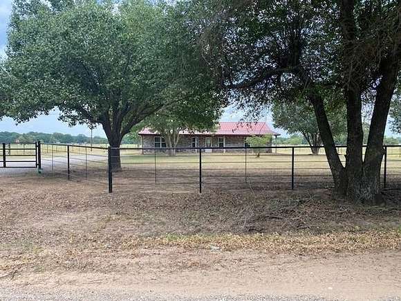 5 Acres of Residential Land with Home for Sale in Telephone, Texas