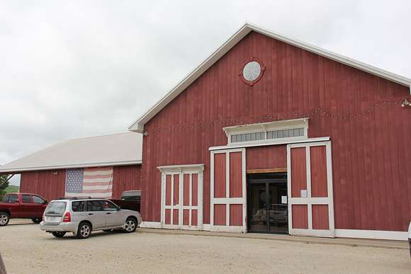 Rear entrance to store in P&B Barn with apple storage